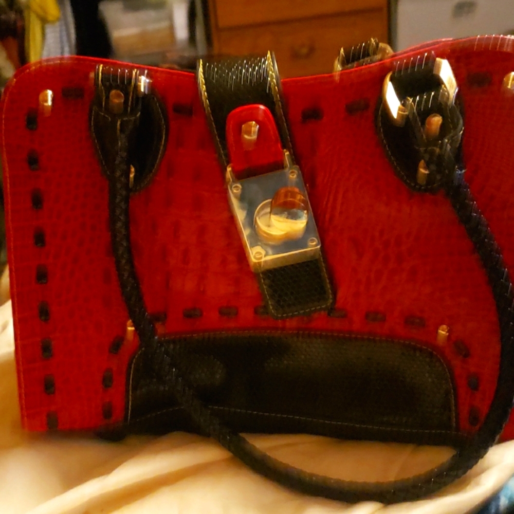 Leather handbag MC red and black.
